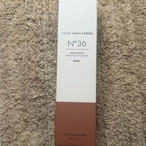 Lux Unfiltered No.36 Supernatural Tanning Mousse in Blood Orange